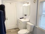 Upper level bathroom with a shower tub combo is shared by all upper level bedrooms and the attic